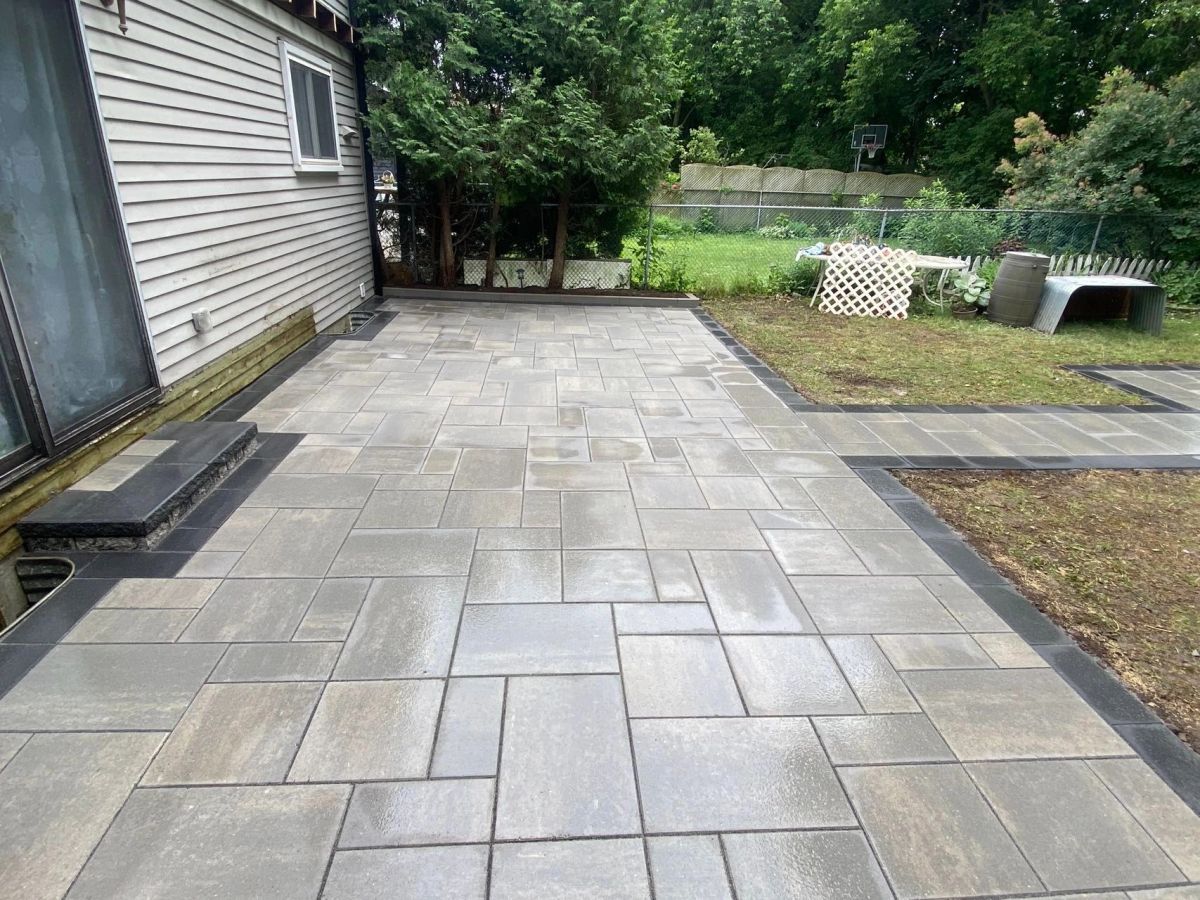 Large interlock patio with dark border